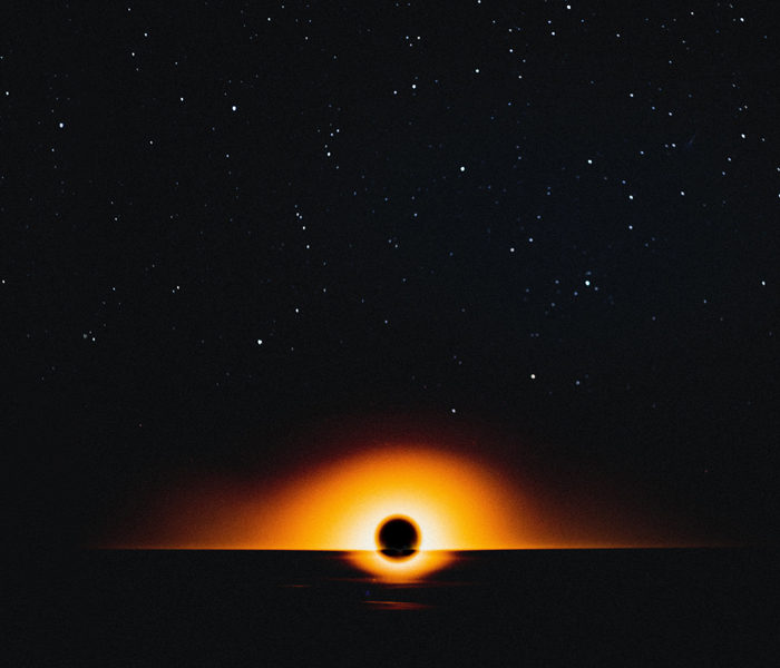 A solar eclipse looking like a black hole.