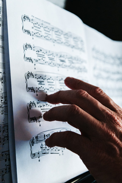 Note sheets on a piano.