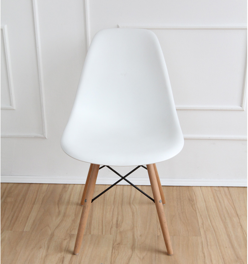 Chairs from Chair in a white hallway with shoes in front of it