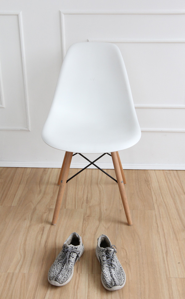 Chairs from Chair in a white hallway with shoes in front of it